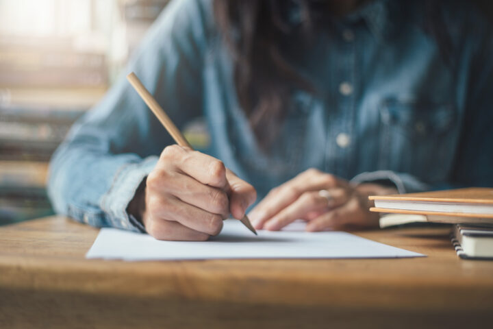 high school university student study hands holding pencil writing